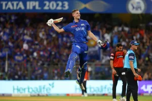 Read more about the article Inexperienced’s 100 boosts Mumbai Indians play-off hopes – Online Cricket News