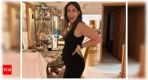 Read more about the article Pregnant Ileana D’Cruz flaunts her baby bump while going for a ride | Hindi Movie News